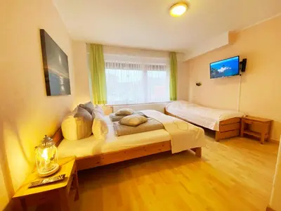 Ein Bett oder Betten in einem Zimmer der Unterkunft Haus am Kurpark Wohnung 4
