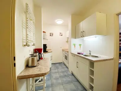 Küche/Küchenzeile in der Unterkunft Haus am Kurpark Wohnung 4