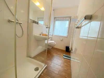 Ein Badezimmer in der Unterkunft Haus am Kurpark Wohnung 11
