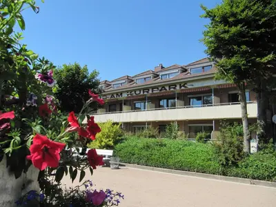Ein Garten an der Unterkunft Haus am Kurpark Wohnung 11