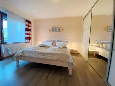 Ein Bett oder Betten in einem Zimmer der Unterkunft Haus am Kurpark Wohnung 14