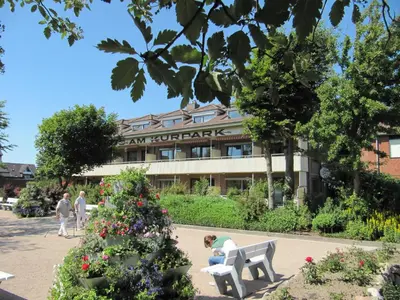 Ein Garten an der Unterkunft Haus am Kurpark Wohnung 14