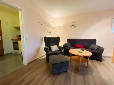 Ein Sitzbereich in der Unterkunft Haus am Kurpark Wohnung 14