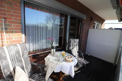 Ein Balkon oder eine Terrasse in der Unterkunft Haus am Kurpark Wohnung 16