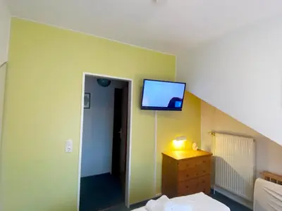TV/Unterhaltungsangebot in der Unterkunft Haus am Kurpark Wohnung 21