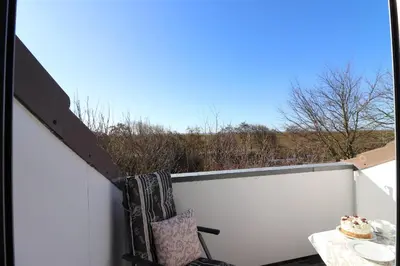 Ein Balkon oder eine Terrasse in der Unterkunft Haus am Kurpark Wohnung 23