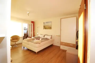 Ein Bett oder Betten in einem Zimmer der Unterkunft Haus Laura Wohnung 3