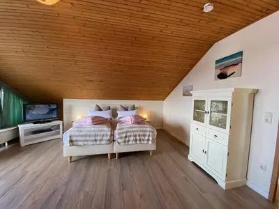 Ein Bett oder Betten in einem Zimmer der Unterkunft Haus Laura Wohnung 5