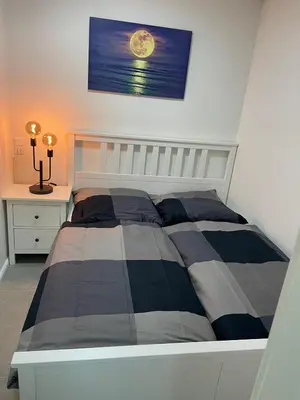 Ein Bett oder Betten in einem Zimmer der Unterkunft Apartmenthaus Frauenpreiss Whg 114