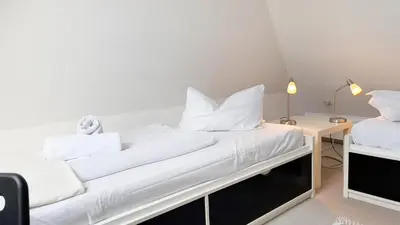 Ein Bett oder Betten in einem Zimmer der Unterkunft Ferienwohnung Jonathan