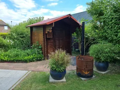 Ein Garten an der Unterkunft Ferienhaus Norderpiep 54 Grad Nord