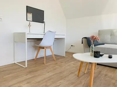 TV/Unterhaltungsangebot in der Unterkunft FEDDERSEN LIVING Kernsanierte Ferienwohnungen - Gemütlich - Netflix - Voll ausgestattet - zentral