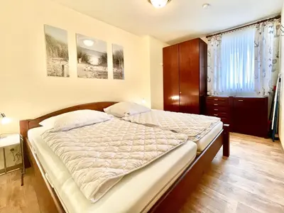 Ein Bett oder Betten in einem Zimmer der Unterkunft Haus 