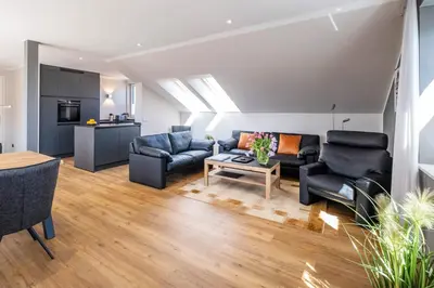 Ein Sitzbereich in der Unterkunft Haus Hummerklippe Apartment 5