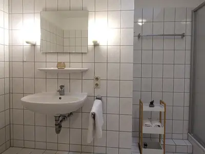 Ein Badezimmer in der Unterkunft Residenz Kormoran 1 5
