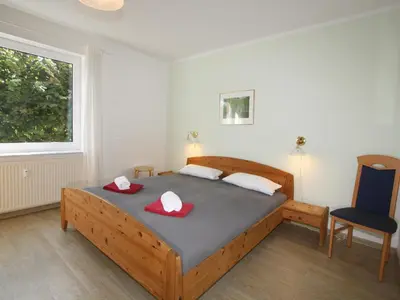 Ein Bett oder Betten in einem Zimmer der Unterkunft Residenz Trossenstek