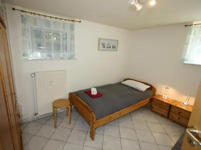 Ein Bett oder Betten in einem Zimmer der Unterkunft Residenz Trossenstek