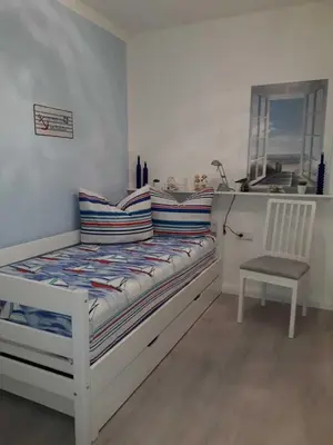 Ein Bett oder Betten in einem Zimmer der Unterkunft Residenz Medemsand