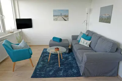 Ein Sitzbereich in der Unterkunft Residenz Nordfeldstraße - direkt am Deich