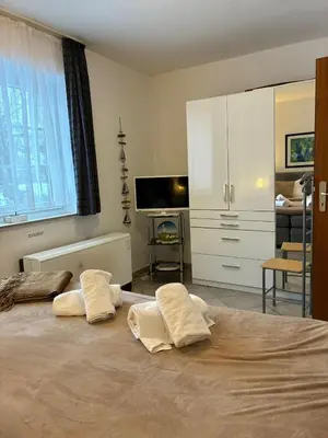 Ein Bett oder Betten in einem Zimmer der Unterkunft Residenz Vogelsand 1