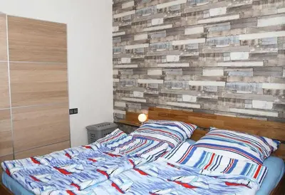 Ein Bett oder Betten in einem Zimmer der Unterkunft Residenz Oceanic