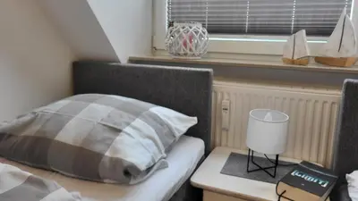 Ein Bett oder Betten in einem Zimmer der Unterkunft Residenz Stranddüne