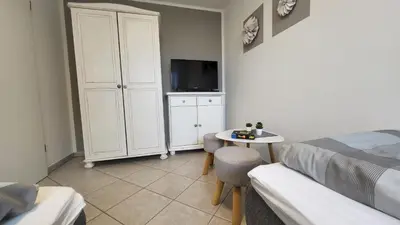 Ein Bett oder Betten in einem Zimmer der Unterkunft Residenz Stranddüne