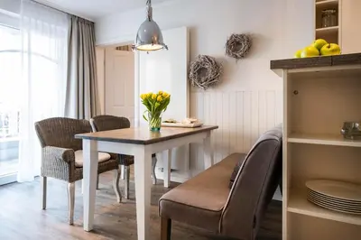 Ein Sitzbereich in der Unterkunft Weisse Villa Apartment 1 1 Lagune