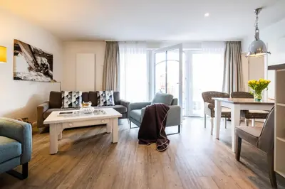 Ein Sitzbereich in der Unterkunft Weisse Villa Apartment 1 1 Lagune