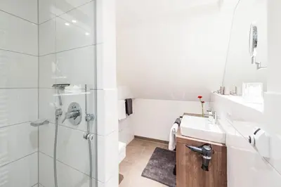 Ein Badezimmer in der Unterkunft Weisse Villa Apartment 3 1 Hafenkante