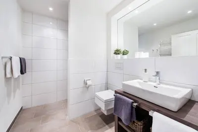 Ein Badezimmer in der Unterkunft Weisse Villa Apartment 3 2 Annis Strandnest