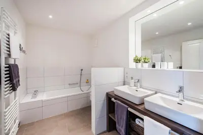 Ein Badezimmer in der Unterkunft Weisse Villa Apartment 3 3 Sonnendeck