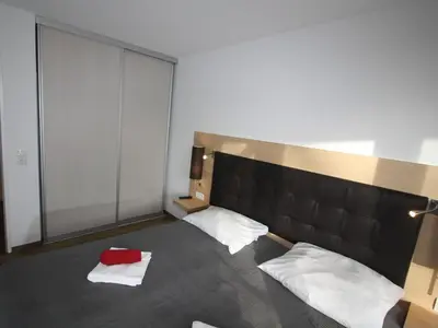 Ein Bett oder Betten in einem Zimmer der Unterkunft HP Touristik - Residenz Hohe Lith Neu 3 0