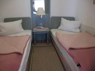 Ein Bett oder Betten in einem Zimmer der Unterkunft Residenz Steinmarne Cuxhaven 2