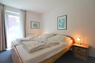 Ein Bett oder Betten in einem Zimmer der Unterkunft Residenz Steinmarne Cuxhaven 2