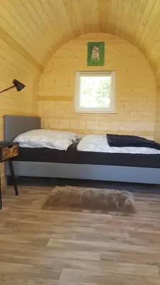 Ein Bett oder Betten in einem Zimmer der Unterkunft Glamping Pod