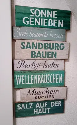 Ein Zertifikat, Auszeichnung, Logo oder anderes Dokument, das in der Unterkunft MeerMomente ausgestellt ist