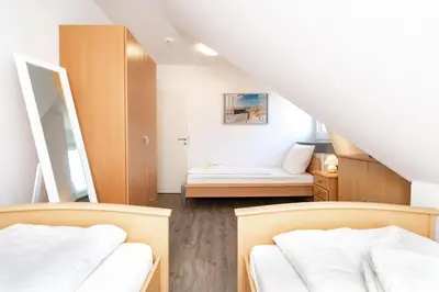 Ein Bett oder Betten in einem Zimmer der Unterkunft Möwe5