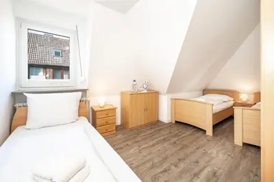 Ein Bett oder Betten in einem Zimmer der Unterkunft Möwe5