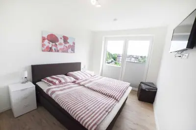 Ein Bett oder Betten in einem Zimmer der Unterkunft Quartier Hohe Geest 24 - a69833