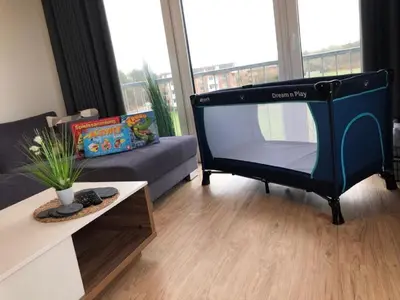 Ein Sitzbereich in der Unterkunft Quartier Hohe Geest 18 - Strandzeit - a69837
