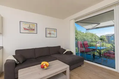 Ein Sitzbereich in der Unterkunft Quartier Hohe Geest 16 - Lena - a69851