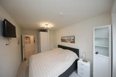Ein Bett oder Betten in einem Zimmer der Unterkunft Quartier Hohe Geest 15 - Nordseebrise - a69852