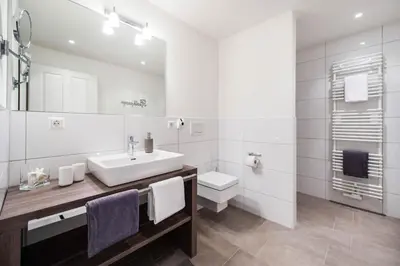 Ein Badezimmer in der Unterkunft Weisse Villa Apartment 1 3 Nord