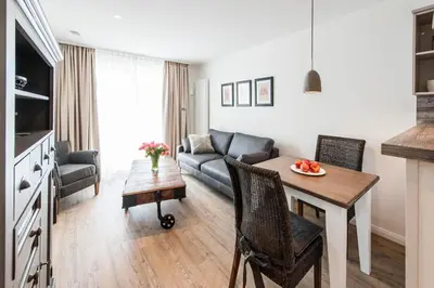 Ein Sitzbereich in der Unterkunft Weisse Villa Apartment 1 3 Nord