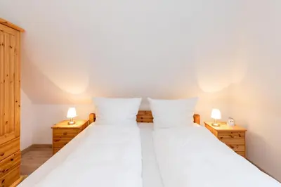 Ein Bett oder Betten in einem Zimmer der Unterkunft Möwe4