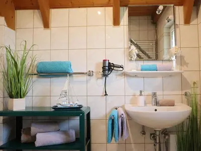 Ein Badezimmer in der Unterkunft Ferienhaus Poseidon