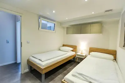 Ein Bett oder Betten in einem Zimmer der Unterkunft Haus Baltic BA03