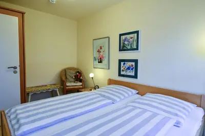 Ein Bett oder Betten in einem Zimmer der Unterkunft Haus Elbe 1 EL14