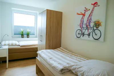 Ein Bett oder Betten in einem Zimmer der Unterkunft Haus Hohe Geest HG11